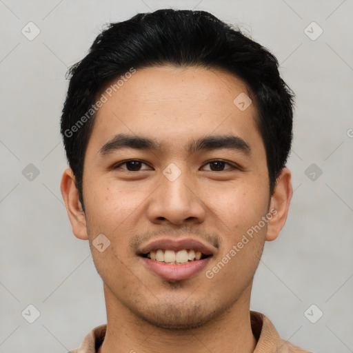 Joyful asian young-adult male with short  black hair and brown eyes