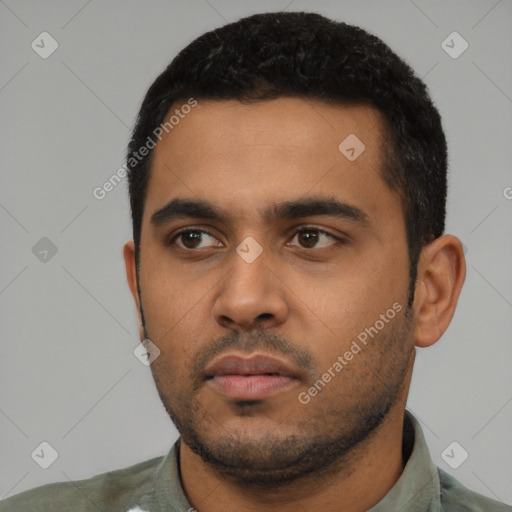 Neutral latino young-adult male with short  black hair and brown eyes