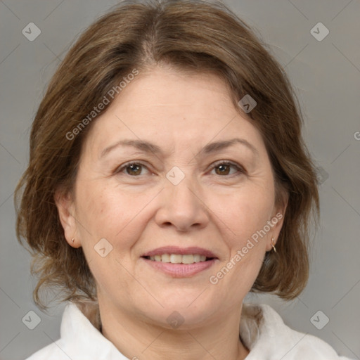 Joyful white adult female with medium  brown hair and brown eyes