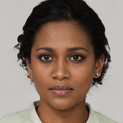Neutral black young-adult female with short  black hair and brown eyes