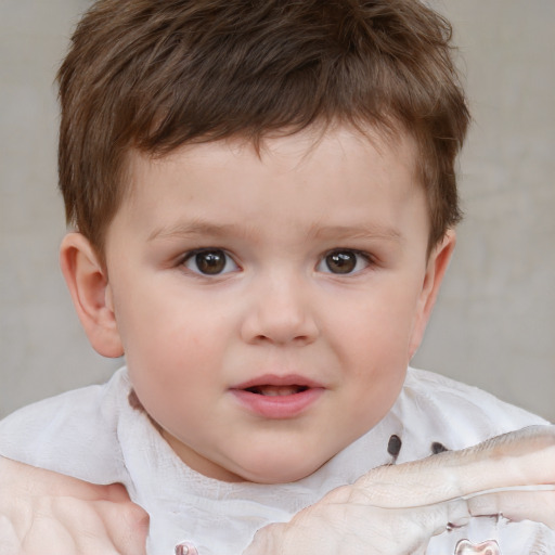 Neutral white child male with short  brown hair and brown eyes