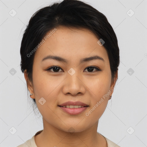 Joyful asian young-adult female with short  brown hair and brown eyes