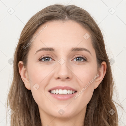 Joyful white young-adult female with long  brown hair and grey eyes