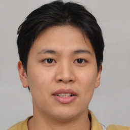 Neutral asian young-adult male with short  brown hair and brown eyes