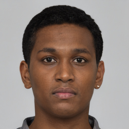 Neutral black young-adult male with short  brown hair and brown eyes