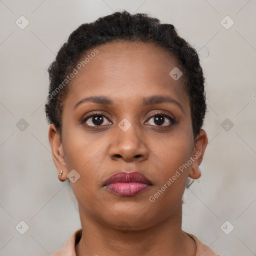 Neutral black young-adult female with short  brown hair and brown eyes