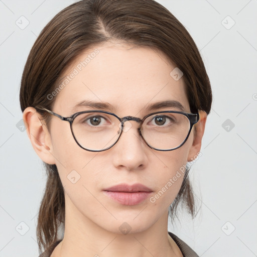 Neutral white young-adult female with medium  brown hair and brown eyes