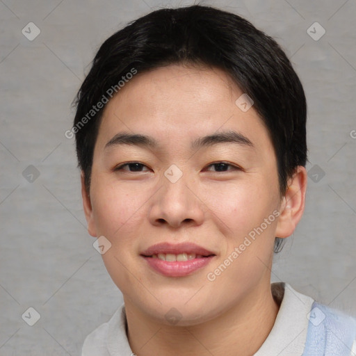 Joyful asian young-adult female with short  brown hair and brown eyes