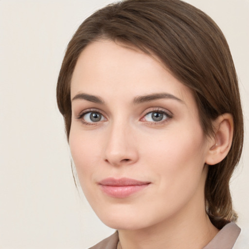 Neutral white young-adult female with medium  brown hair and brown eyes