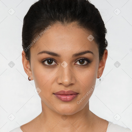 Joyful latino young-adult female with short  brown hair and brown eyes