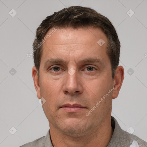 Neutral white adult male with short  brown hair and brown eyes