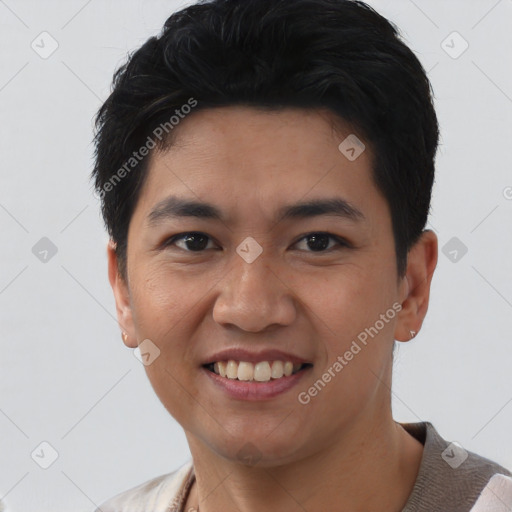 Joyful asian young-adult male with short  black hair and brown eyes