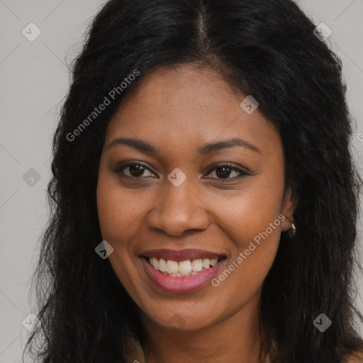 Joyful black young-adult female with long  brown hair and brown eyes