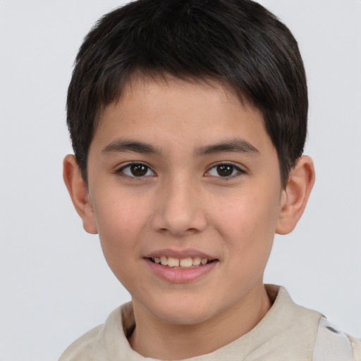 Joyful white child male with short  brown hair and brown eyes