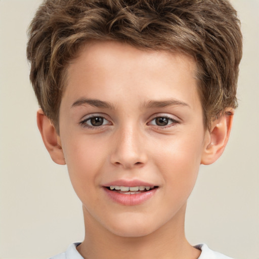 Joyful white child male with short  brown hair and brown eyes