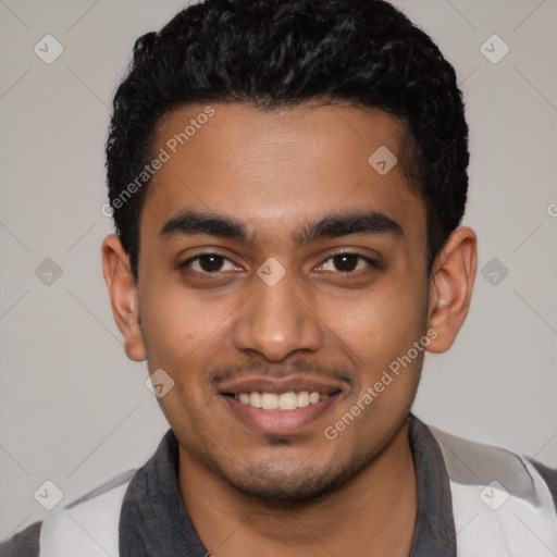 Joyful latino young-adult male with short  black hair and brown eyes