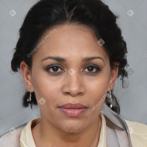 Joyful latino adult female with short  brown hair and brown eyes