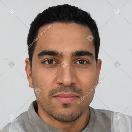 Neutral latino young-adult male with short  black hair and brown eyes