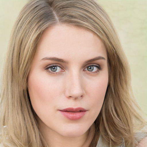 Neutral white young-adult female with long  brown hair and green eyes