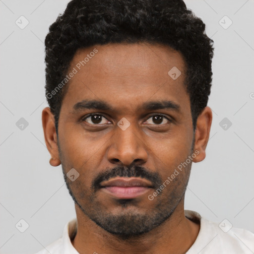 Neutral latino young-adult male with short  black hair and brown eyes