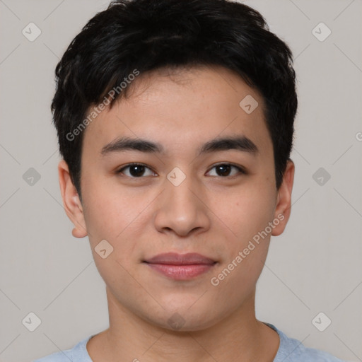 Joyful asian young-adult male with short  black hair and brown eyes