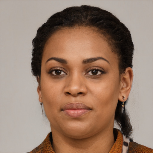 Neutral black young-adult female with medium  black hair and brown eyes