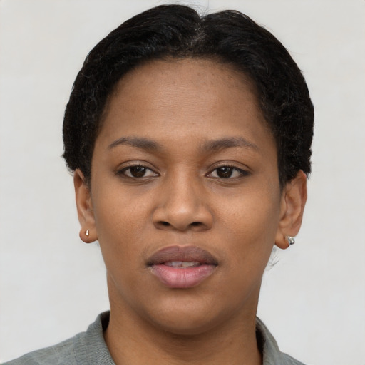 Neutral black young-adult female with short  black hair and brown eyes