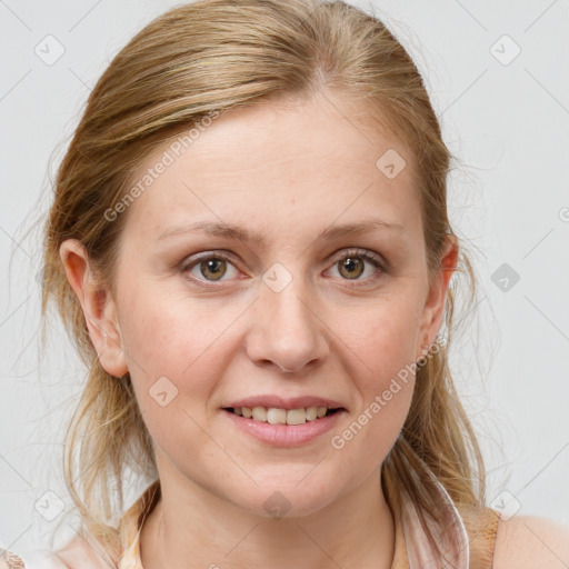 Joyful white young-adult female with medium  brown hair and blue eyes