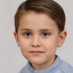 Joyful white child female with short  brown hair and brown eyes