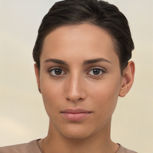 Neutral white young-adult female with short  brown hair and brown eyes