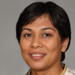 Joyful white adult female with medium  brown hair and brown eyes