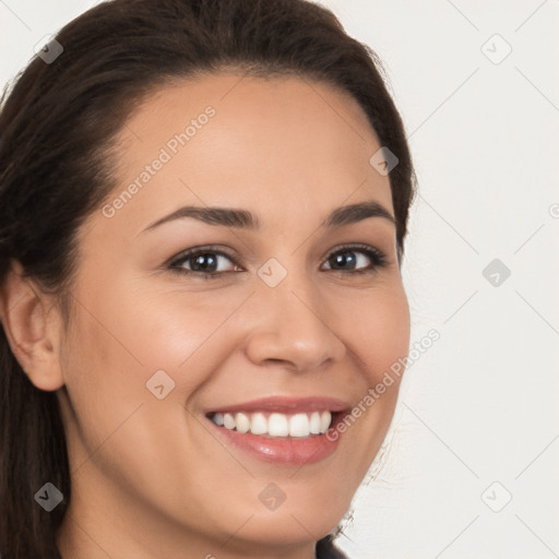 Joyful white young-adult female with long  brown hair and brown eyes