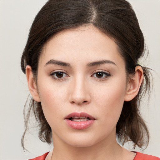 Neutral white young-adult female with medium  brown hair and brown eyes