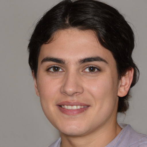 Joyful white young-adult male with medium  brown hair and brown eyes