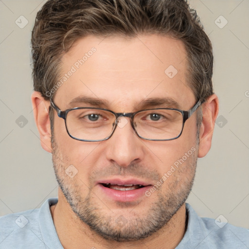 Joyful white adult male with short  brown hair and brown eyes