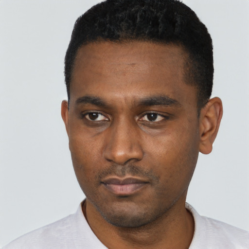 Neutral black young-adult male with short  black hair and brown eyes