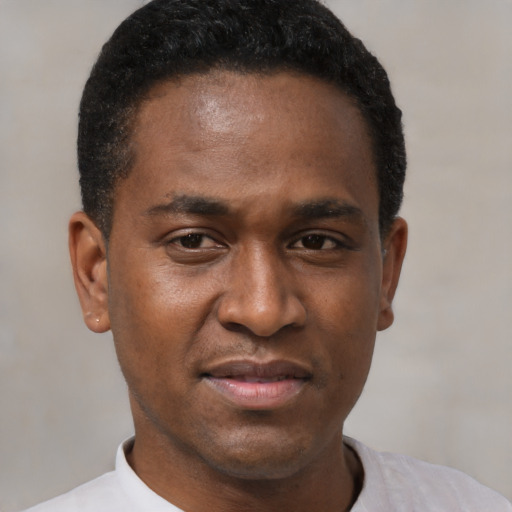 Neutral black adult male with short  black hair and brown eyes