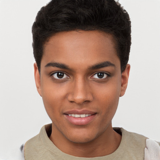 Joyful black young-adult male with short  brown hair and brown eyes