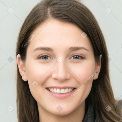 Joyful white young-adult female with long  brown hair and grey eyes