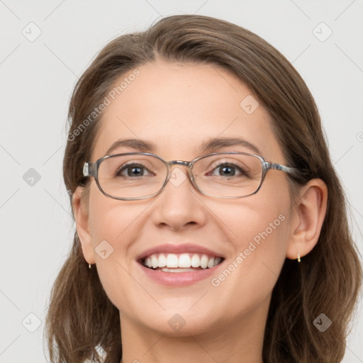 Joyful white young-adult female with long  brown hair and grey eyes