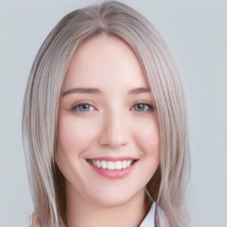 Joyful white young-adult female with long  brown hair and blue eyes