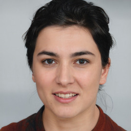 Joyful white young-adult female with medium  brown hair and brown eyes