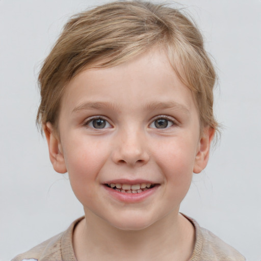 Joyful white child male with medium  brown hair and blue eyes
