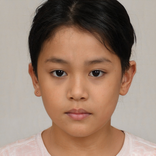 Neutral asian child female with short  brown hair and brown eyes