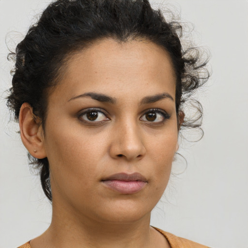 Neutral latino young-adult female with short  brown hair and brown eyes