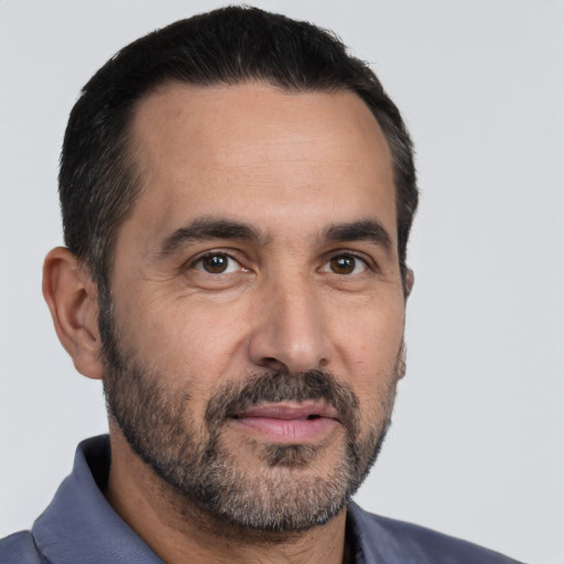 Neutral white adult male with short  black hair and brown eyes