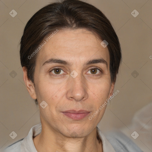 Joyful white adult female with short  brown hair and brown eyes