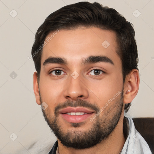 Joyful white young-adult male with short  brown hair and brown eyes