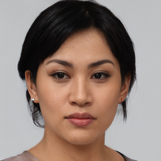 Neutral asian young-adult female with medium  black hair and brown eyes