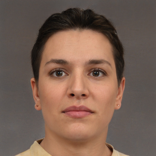 Neutral white young-adult female with short  brown hair and brown eyes